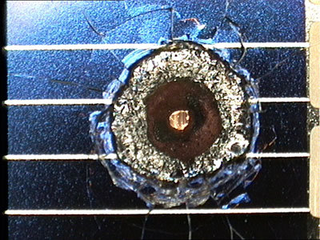 Illustration for article titled In Space, Even A Single Grain Can Lead To Catastrophe